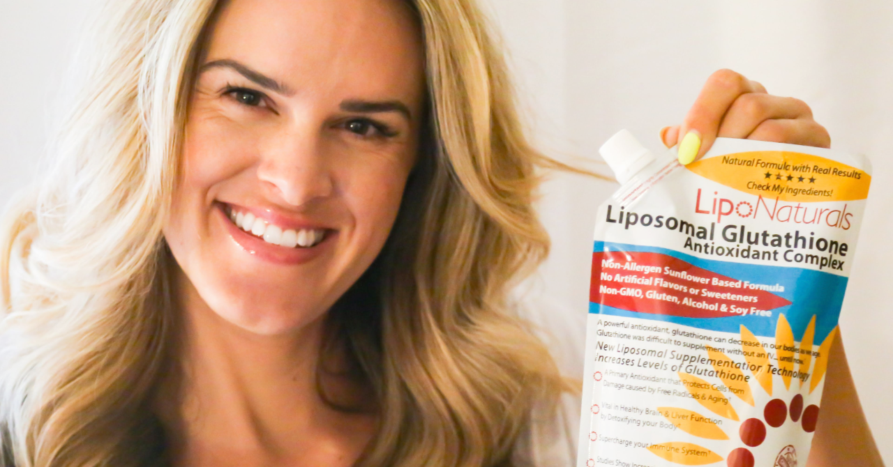 Woman Holding Lipo Naturals Liposomal Glutathione
